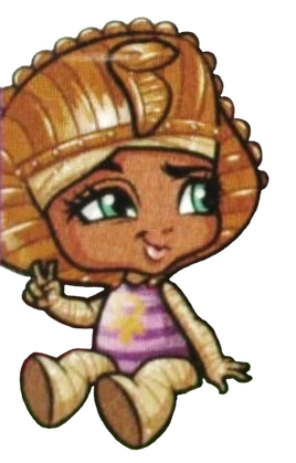 Sandy de Nile as a toddler mummy wrapped in bandages